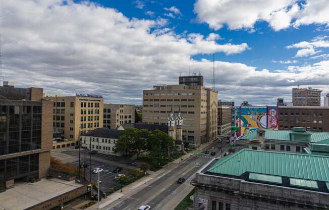 a view of the city from a bedroom in the Lofts at 5 Lyon in Grand Rapids, MI
