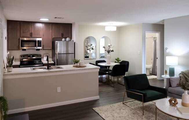 dining area next to an open-concept kitchen