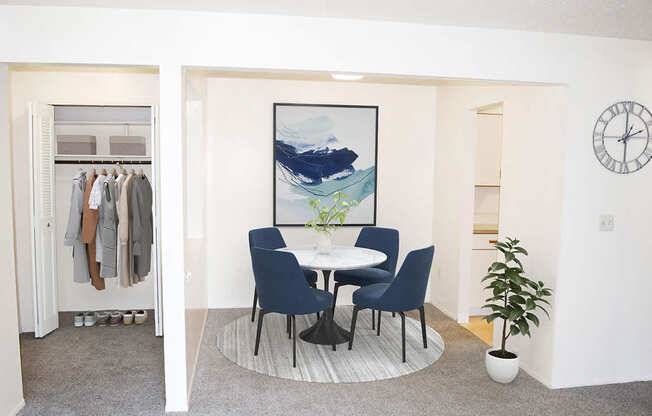 Dining room with an entry door to a closet at Seville Apartments in Kalamazoo, MI 49009