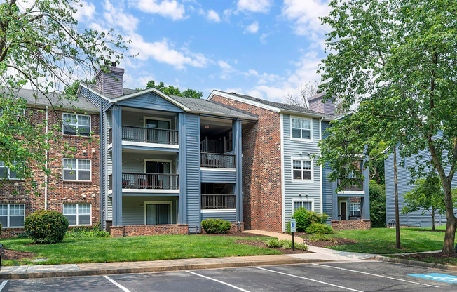 our apartments at the overlook feature a spacious courtyard with green grass and trees