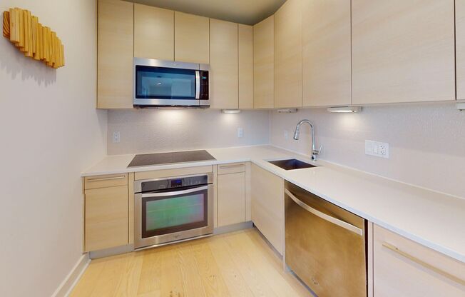 Top Floor Updated One Bedroom W/Sleek Appliances, Washer/Dryer Combo in Amazing Location!