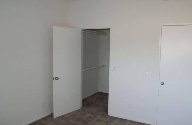 Walk in closet with storage space