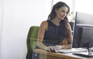 a woman sitting on a table