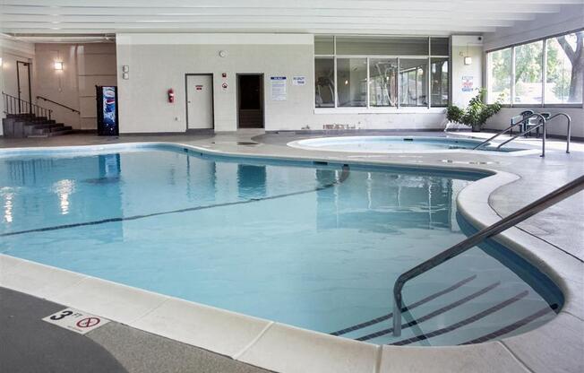 a large swimming pool in a hotel room