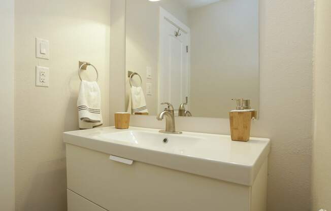 Soco at Alpine Bathroom Sink and mirror with decor