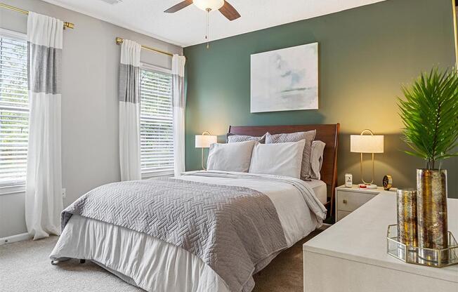 model home master bedroom with ceiling fan