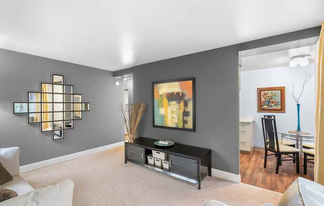 a living room with a couch and a table