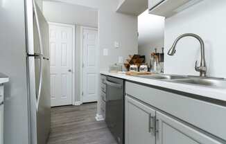 Apartment home with galley kitchen at Woods of Fairfax