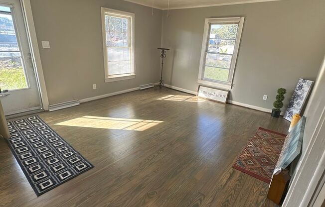 2 Bed House w/ Wooden floors, Large Front porch, Central HVAC & Huge yard!