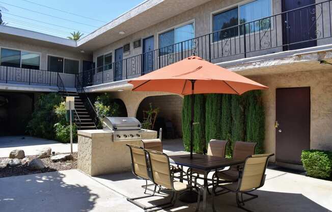 outdoor table next to the grilling area