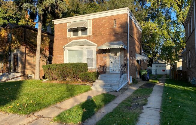 9121 S UTICA AVE