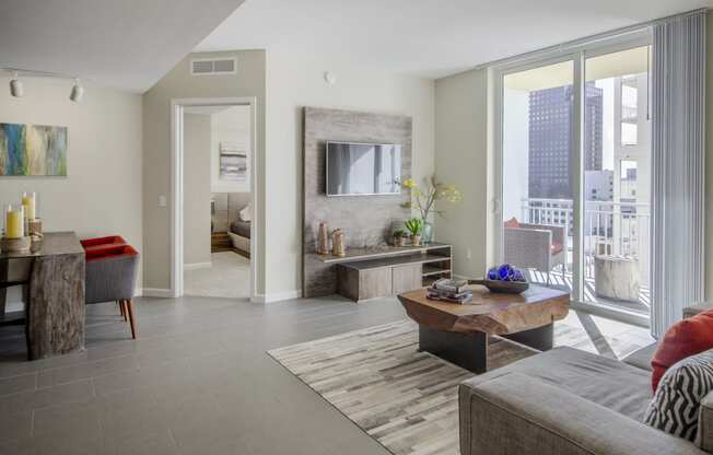 VU New River - Living Room with Porcelain Tile, Sliding Door and Private Balcony