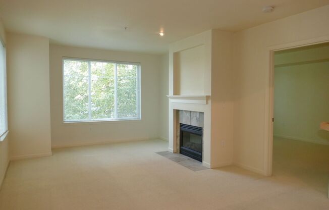 Light and Bright 1 Bedroom Condo at the Ballard Place Condominiums with Parking Included