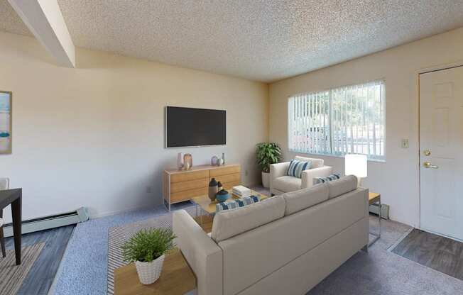 a living room with a couch and a tv