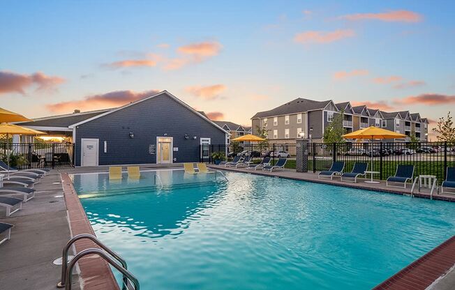 Outdoor Pool & Sundeck At Dusk