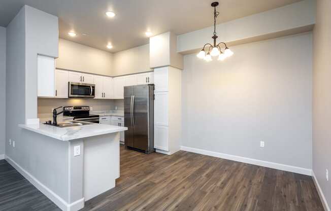 a kitchen and living room in a house