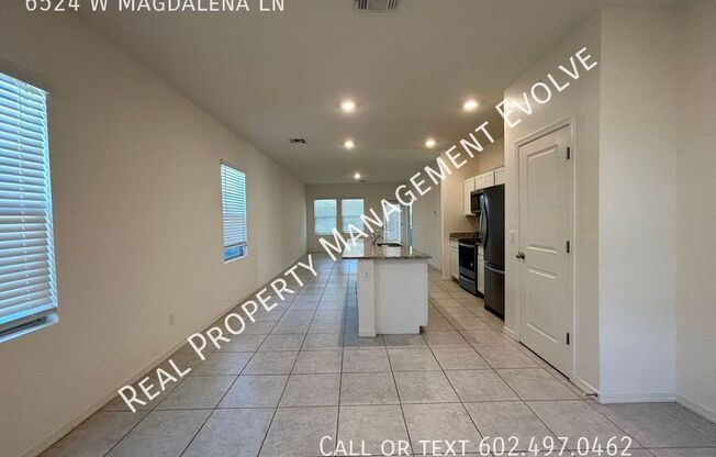 6524 W MAGDALENA LN