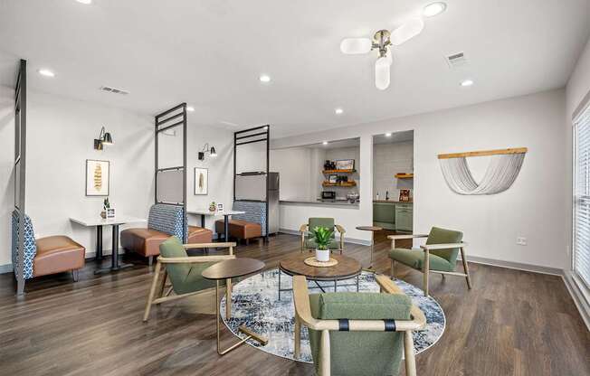 A modern dining room with a round table and chairs.
