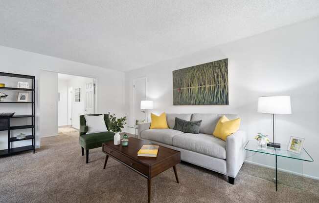 a living room with a couch and a coffee table