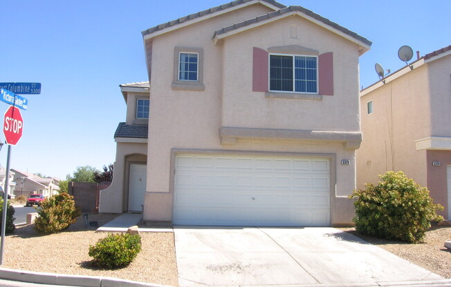 THIS 1,596 SQ. FT. HOME HAS 3 BEDROOMS, 2.5 BATHROOMS, A 2 CAR GARAGE LOCATED ON A CORNER LOT AND NEW WOOD FLOORING