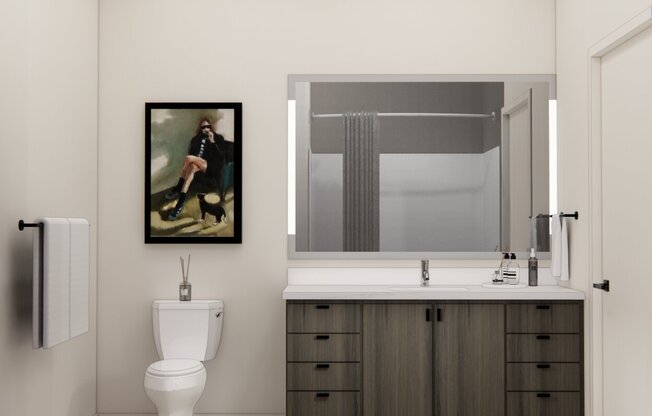 Designer bathrooms with quartz countertops and front lit mirrors.