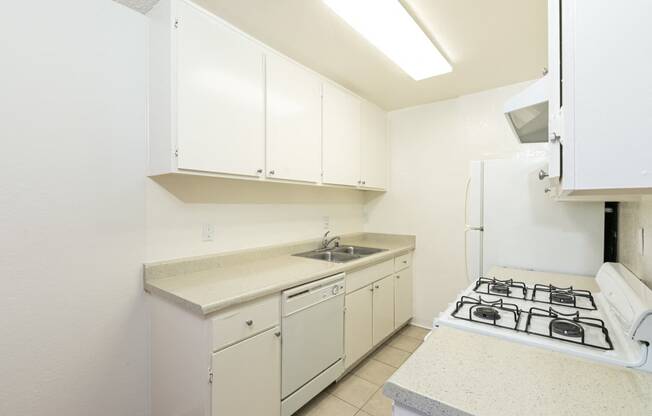 Kitchen with White Appliances and White Cabinets