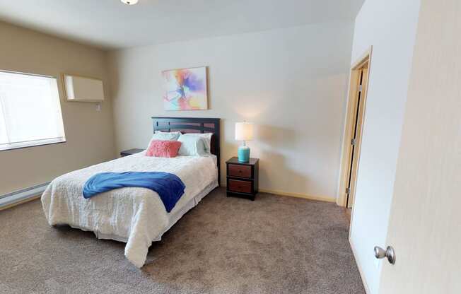 Bedroom with bed at Stonebridge Villas Apartments, North Dakota