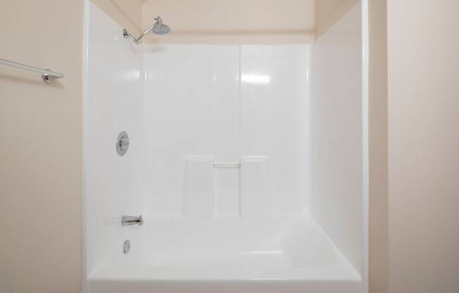 Large bathtub and shower at the Atrium Apartments in San Diego, California.