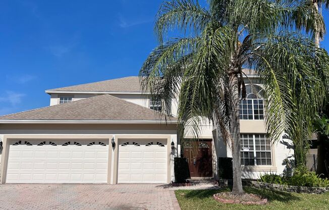 Executive 4/3.5 Pool Home with Water View w/3-Car Garage in Lee Vista Area close to Lake Nona