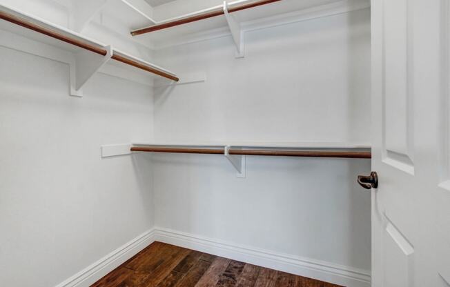 a walk in closet in a 555 waverly unit