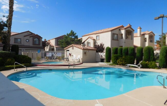 Gorgeous 3 bedroom condo with a 2 car garage! Tons of upgrades*Southwest*Gated community*