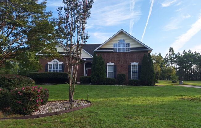 Magnificent Three bedroom, Three bathroom Brick Home! Located in the Spring Valley Community