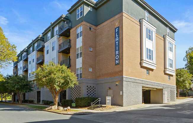 Flatiron West Trade Apartments exterior view of building with "Flatiron" on the side
