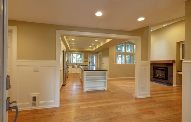 Mercer Island: 5-Bed, 4-Bath Home with Water Views, Large Yard, Updated Kitchen, Private Primary Suite