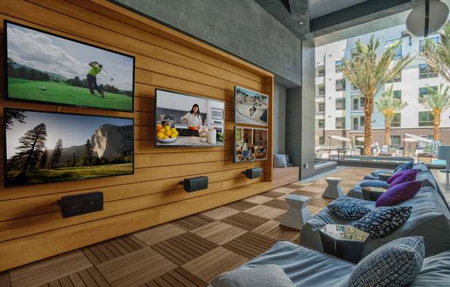 lounge area with tvs