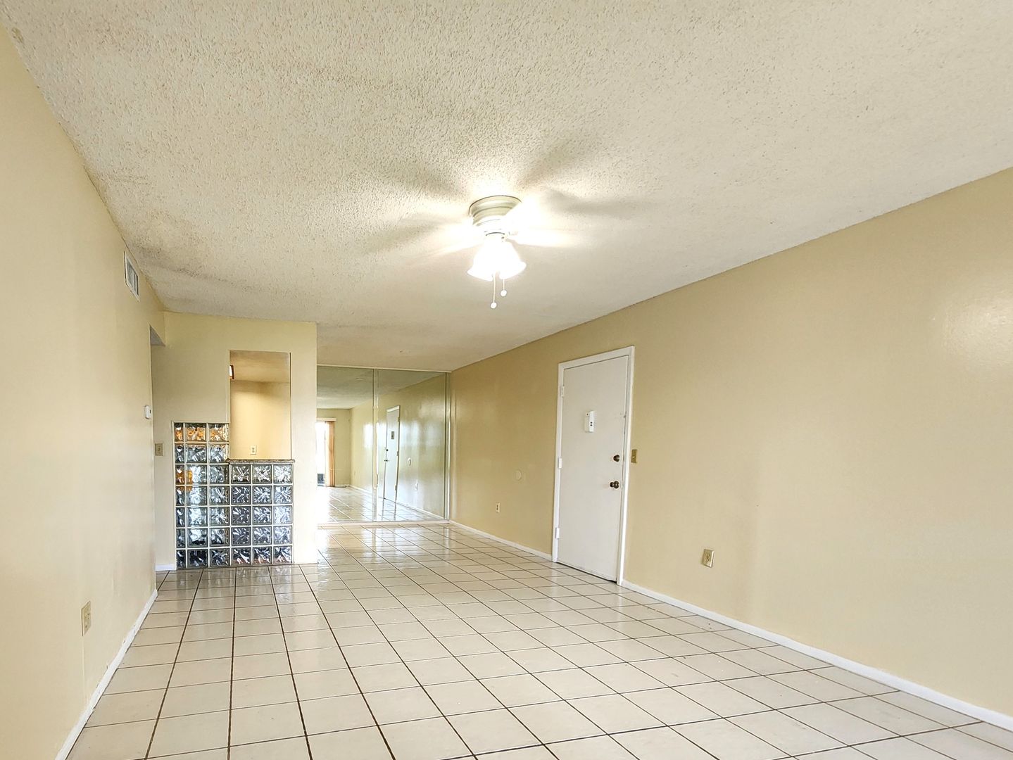 Ground Floor Unit; Lake Front View; All-Tile Flooring; Pool/Tennis/Laundry