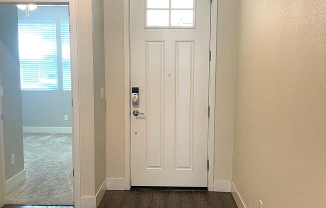 Beautiful two story home with SOLAR, NEW CARPET, PAINT, & LIGHT FIXTURES!