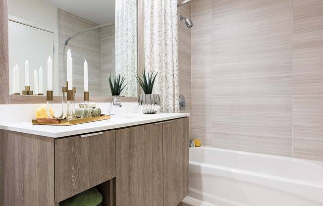 Modern bathroom sink and tub at The Rey, San Diego, CA