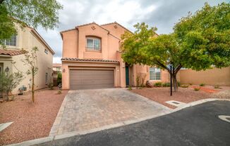 THE PLEASURE OF LIVING IN GORGEOUS SUMMERLIN GATED COMMUNITY!