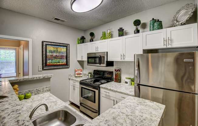 Spacious kitchen with stainless appliances at Wyndchase at Aspen Grove