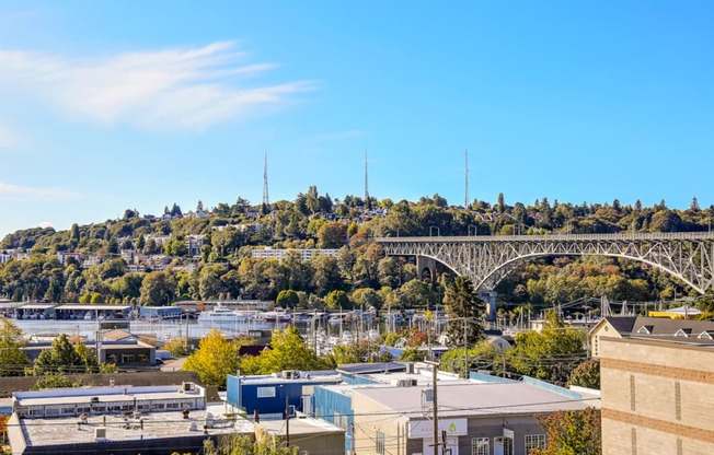 The Hayes on Stone Way Apartments view of the city with a bridge over the water and buildings at The Hayes on Stone Way, Seattle, WA