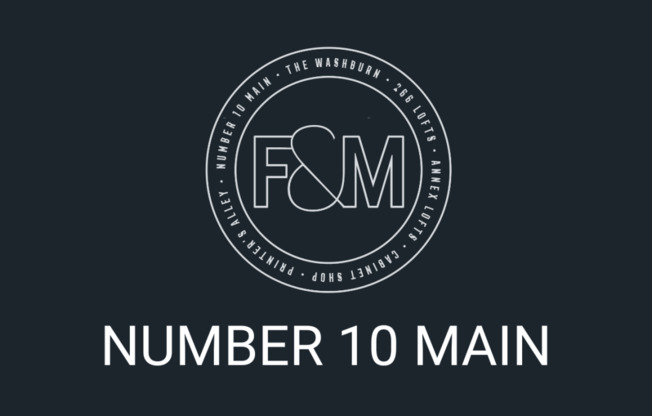 a black and white logo with the words number 10 main on it