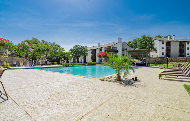 the preserve at ballantyne commons pool with apartment buildings