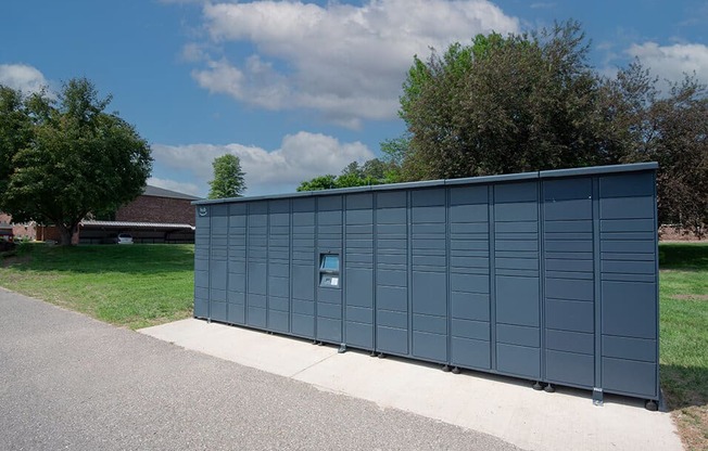 a large blue metal building with a sign on the side of it