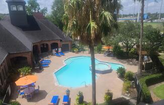 the community pool and spa from the second floor