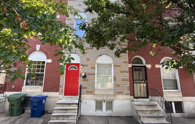 Charming Baltimore Rowhome with Private Deck & Exposed Brick