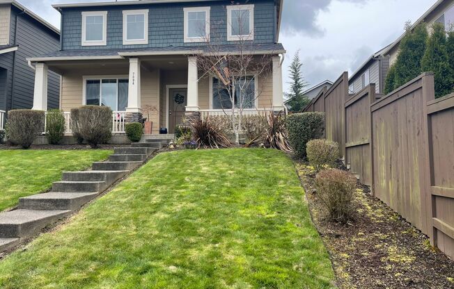 Spacious 4-Bedroom Home with Inviting Curb Appeal, Modern Kitchen, and Backyard Retreat