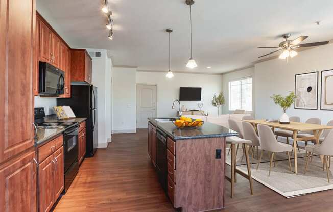 a kitchen and dining area in a 555 waverly unit