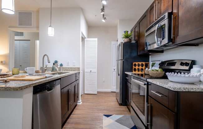 Kitchen Area at Sancerre at Sand Lake Apartments