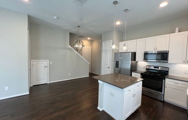 Introducing a stunning and impeccably maintained townhome that radiates the allure of modern luxury and comfort!